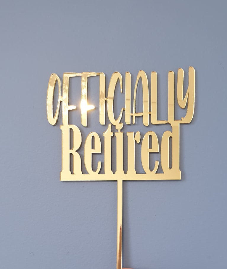 Officially Retired Cake Topper